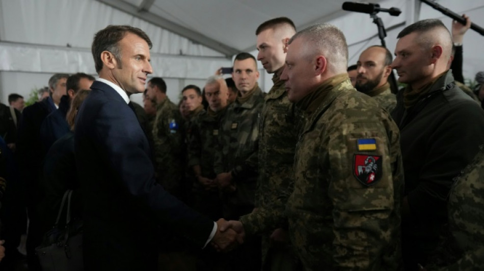 Macron to host Ukraine's Zelensky after meeting Ukrainian troops