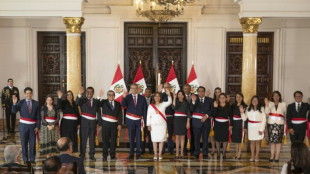 Amid protests, Peru's new leader swears in cabinet