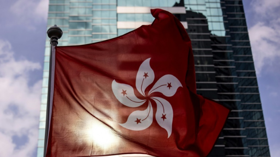 Hong Kong cancels passports of six democracy activists