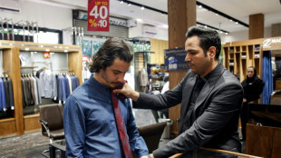 Once banned, now back: Iran sees timid return of neckties