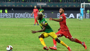 Minnows Equatorial Guinea win shoot-out to set up Senegal clash