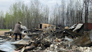 Canada wildfires slow allowing evacuees to return, but hot, dry weather coming