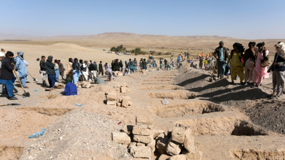 Volunteers dig for Afghan quake survivors as aid trickles in