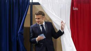 Disaster averted, Macron still faces trouble ahead
