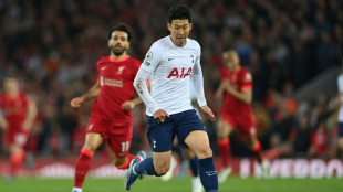 Liverpool's title bid hit by Spurs draw, Man Utd thrashed at Brighton