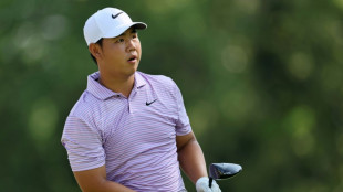 Bogey-free Kim keeps PGA Travelers lead with Scheffler second