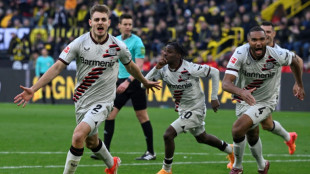 Leverkusen stay unbeaten with last-gasp strike at Dortmund