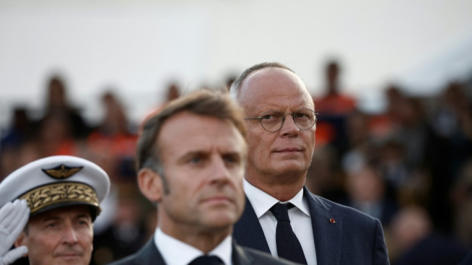 Macron, ex-PM remember bloody liberation of French port