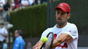 'Fine' Djokovic dons cycling crash helmet after Rome bottle drama