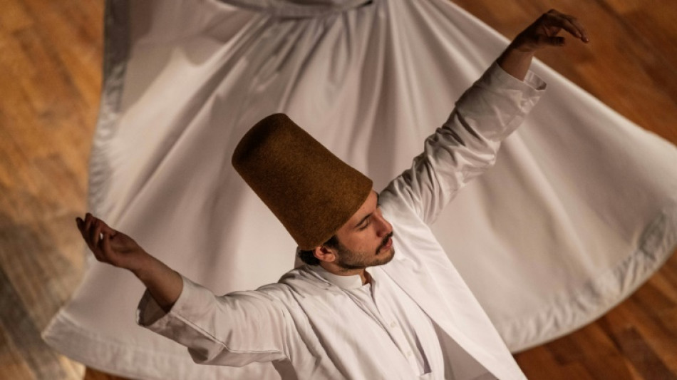 'Tombstone' hats remind whirling dervishes of their death