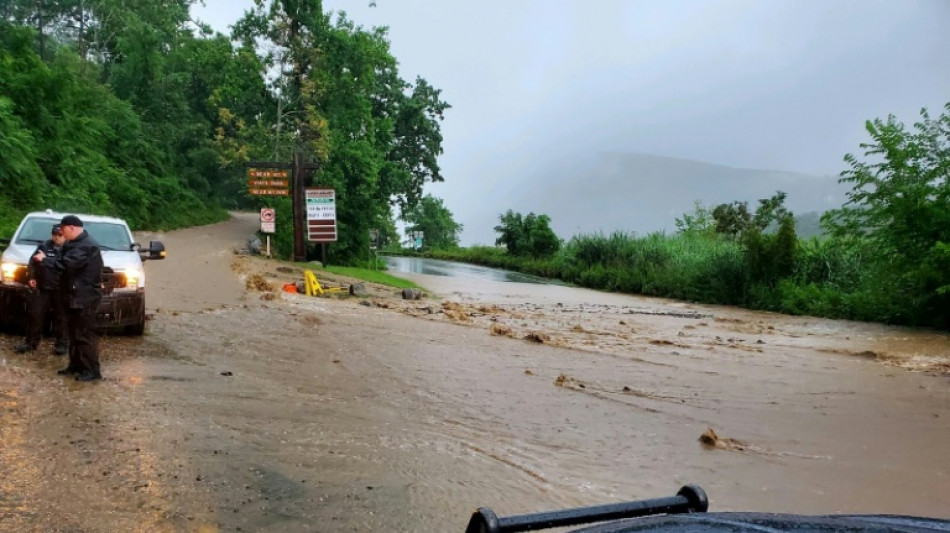 Heavy rains and flooding pummel US northeast, one dead