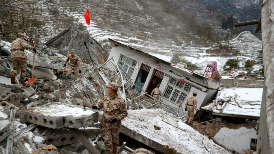 Race to find dozens trapped in southwest China landslide