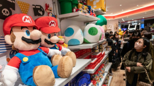 Nintendo cuts net profit forecast as chip shortage hits console sales