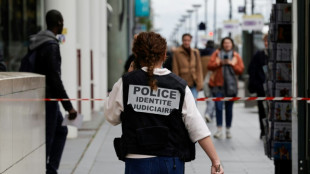 Paris police fire on woman making 'threats' at train station