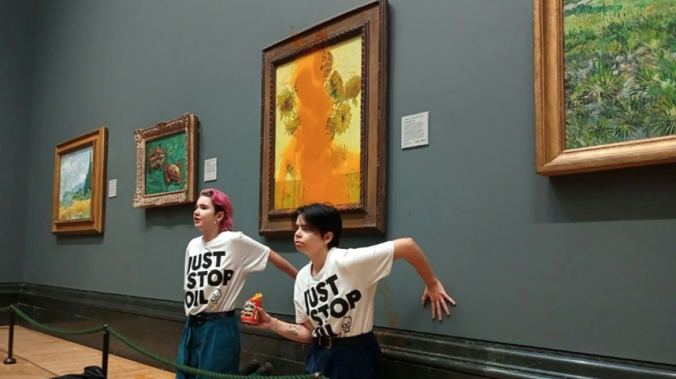 Eco-activists throw soup over Van Gogh's 'Sunflowers' in London 