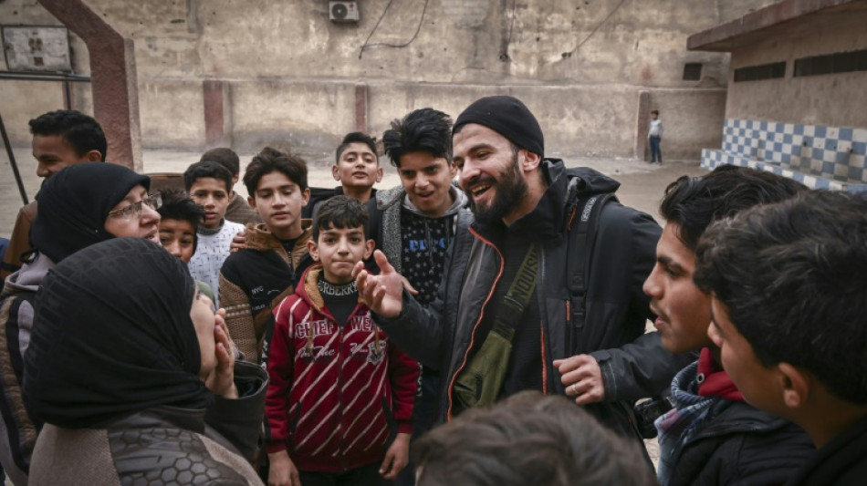 O retorno emotivo do fotógrafo da AFP Sameer al-Doumy à sua cidade na Síria