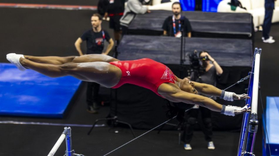 Biles back to 'calm, sometimes goofy' self as Olympic history beckons