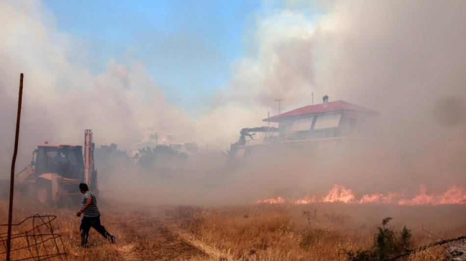 Lesbos wildfire forces hundreds to evacuate from tourist resort