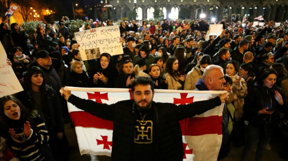 Tens of thousands rally in Georgia despite backtrack on 'foreign agent' bill 