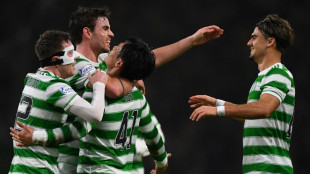 Rampant Celtic thrash Motherwell to open four-point lead