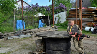 'Playing war': Conflict militarises Ukraine children