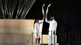 Historic river parade, Dion show-stopper ignite Paris Olympics